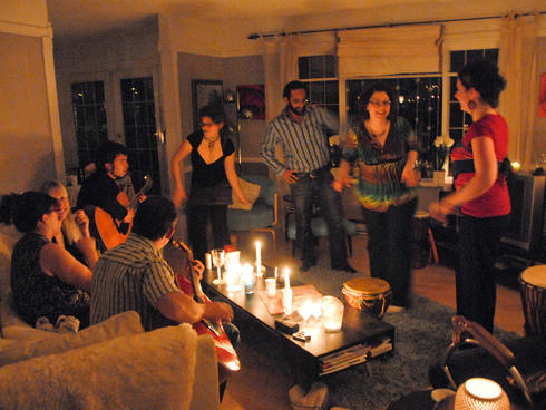 People celebrating the Earth Hour at a candlelight party in Vancouver