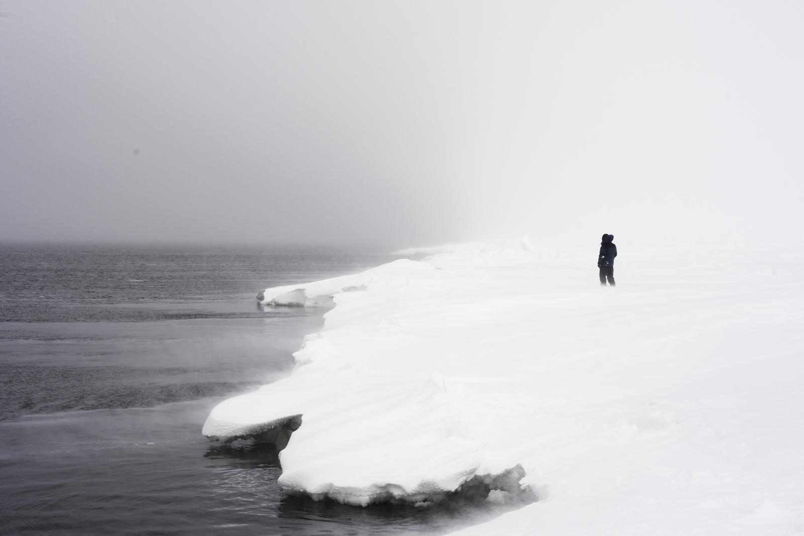 Man standing on glacier