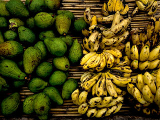 Avocados and bananas for sale