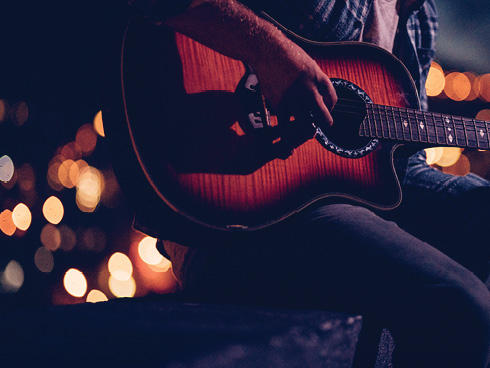 person playing guitar
