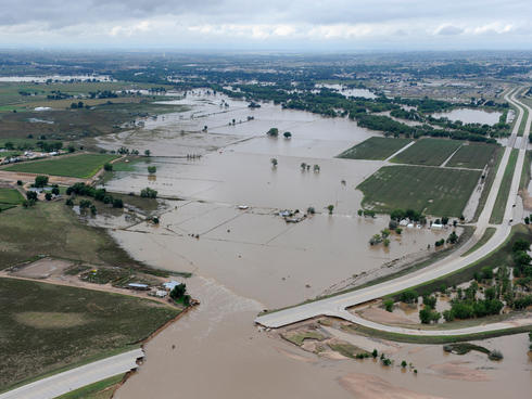 South Platte River flooding cities and farms, aerial view.