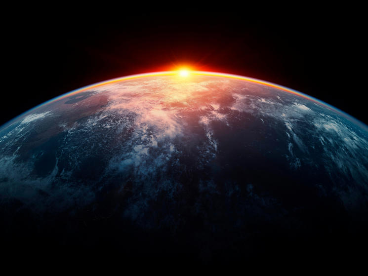 Image of sunlight eclipsing planet Earth