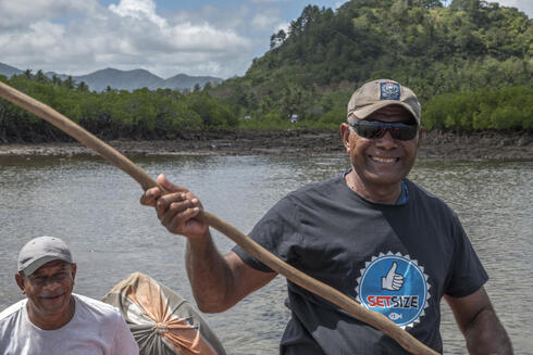 Boating along the Fiji coastline.