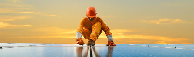 A man working at solar power station