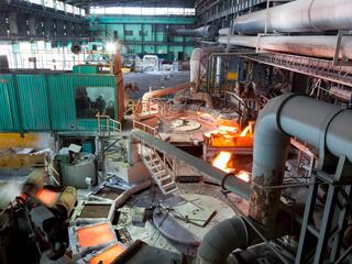 Machinery inside a blast furnace with very hot materials