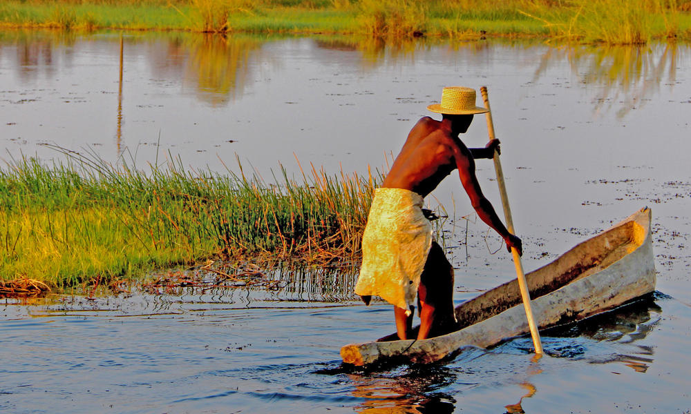 Man in canoe KAZA