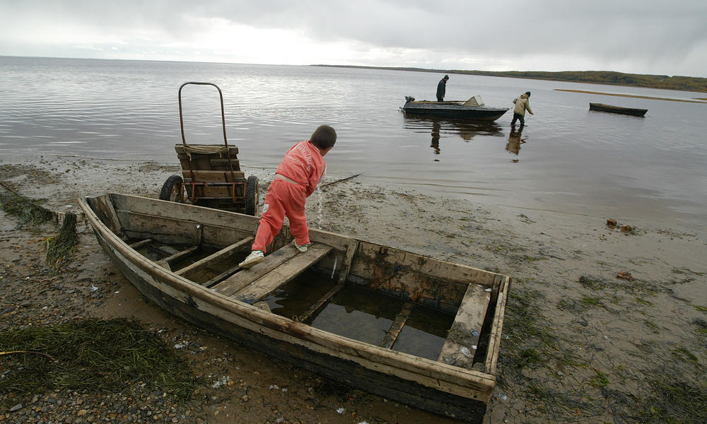 Man fishing for Salmon, Eastern Russia