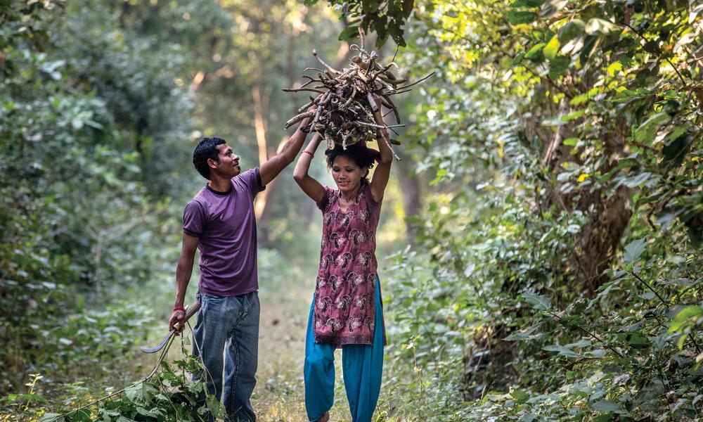 Although Devi’s husband is with her in this photo, he regularly travels to find work, leaving much daily life in Devi’s hands.